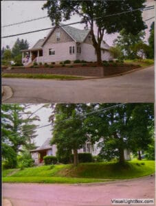 Before and After Images of a Hardscape Wall on the edge of a hill